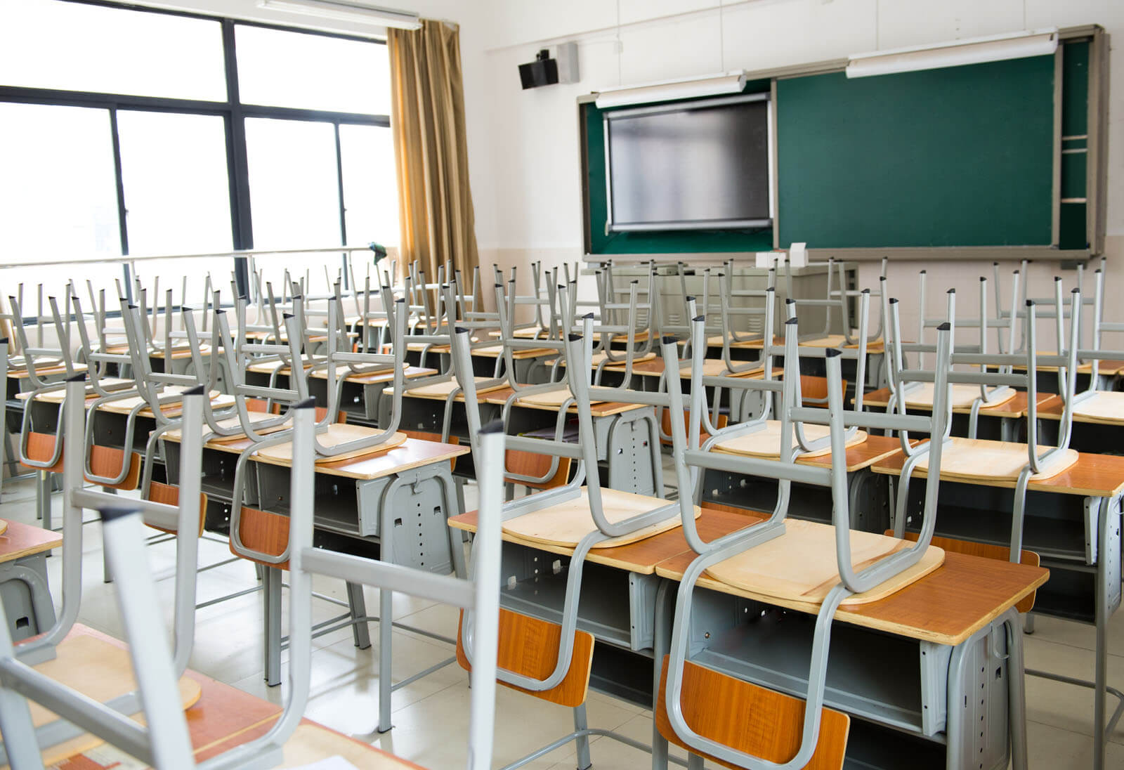 school chairs upside down on desks